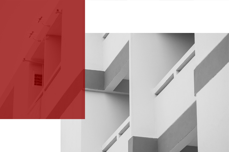 Architectural detail showing balconies and large structural walls with a red rectangle on the left hand side.