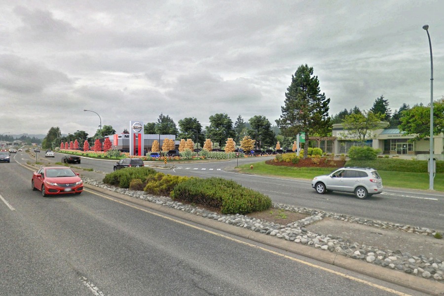 A exterior rendering of the Nissan Dealership in Nanaimo, a commercial project, designed by Alan Lowe Architecture.